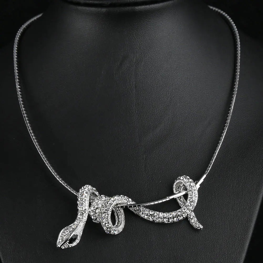 Diamond-Encrusted Snake Collar and Silver Necklace