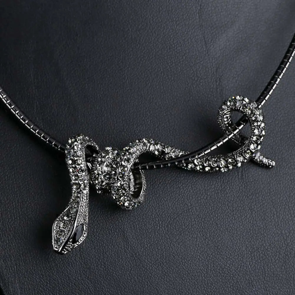 Diamond-Encrusted Snake Collar and Silver Necklace