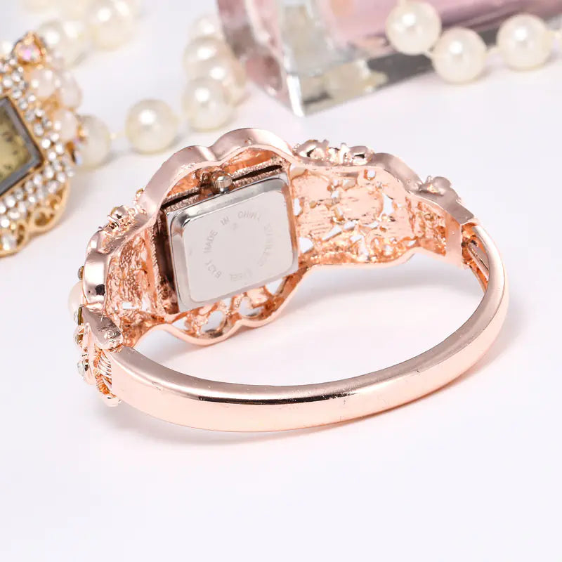 Pearl & Diamond Hollow Bangle Watch